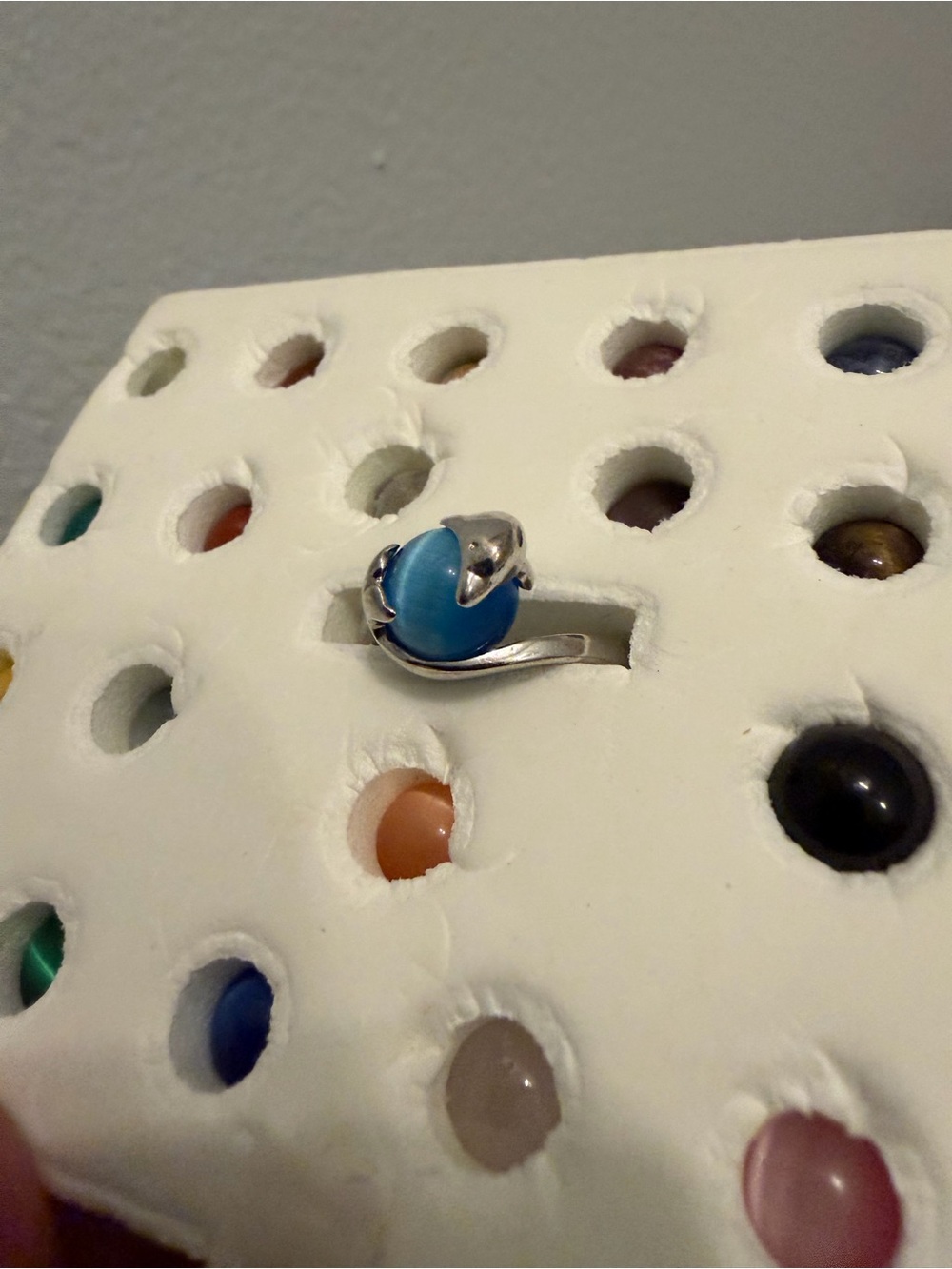 Dolphin ring with interchangeable stones